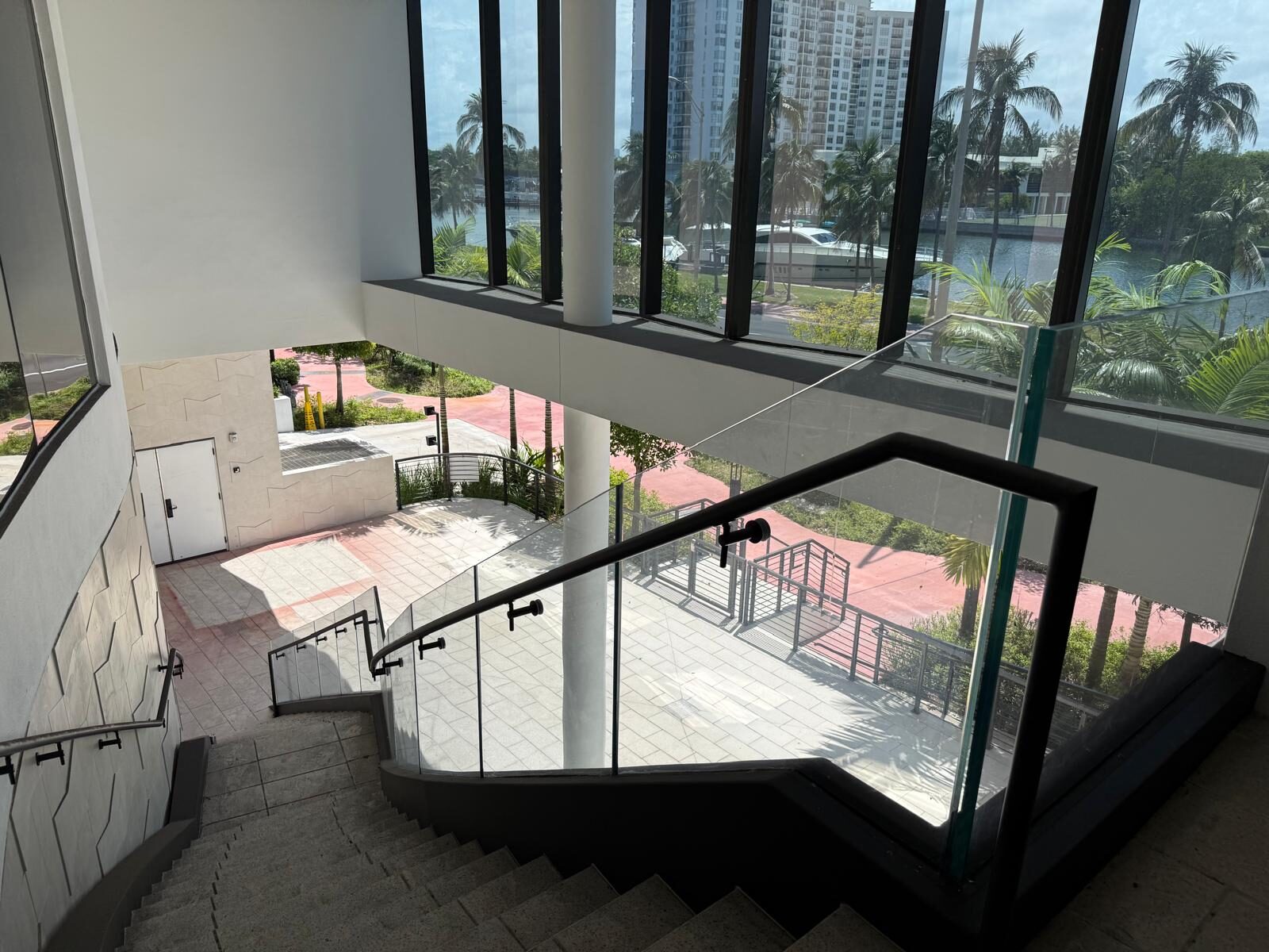 Staircase with floor-to-ceiling windows